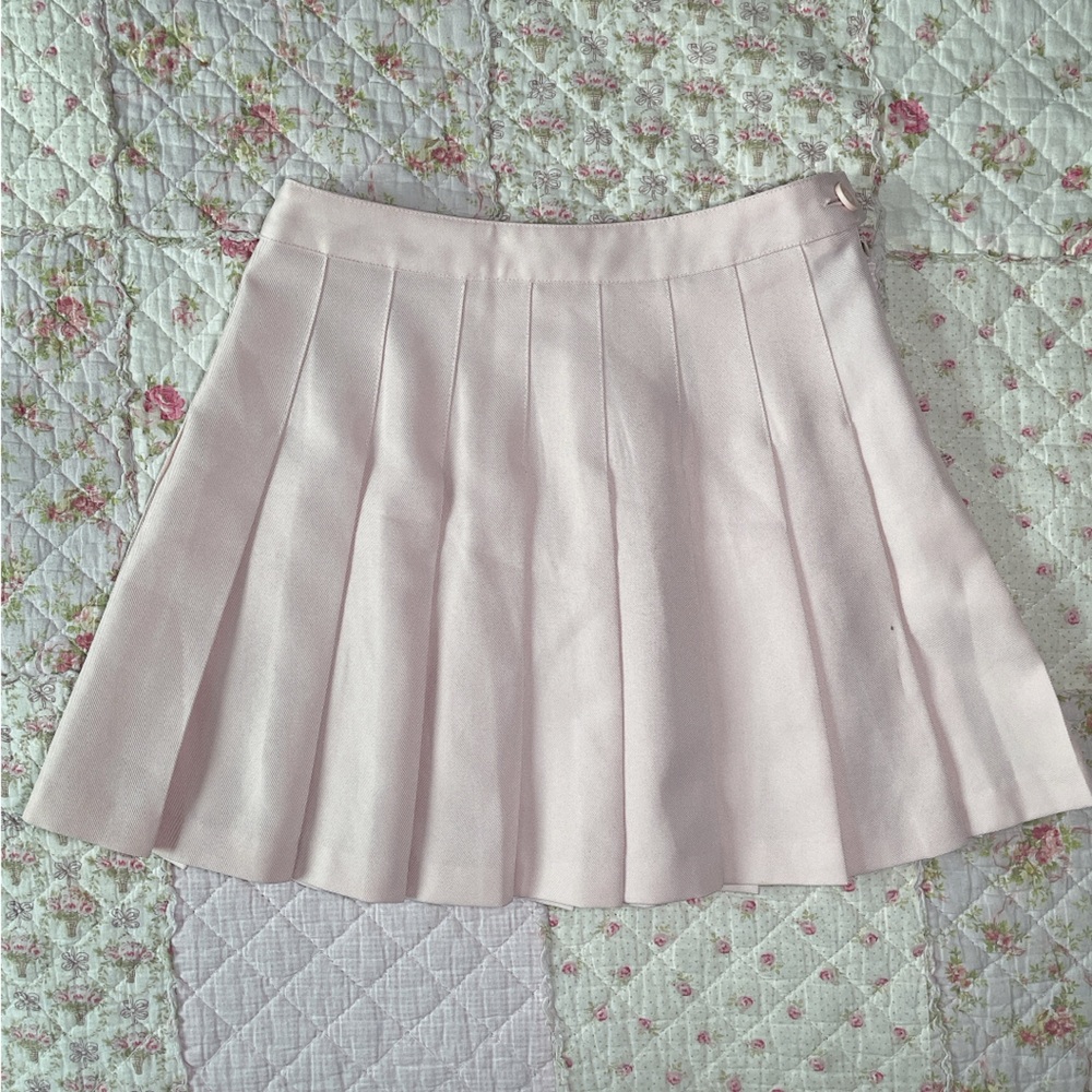 Pale pink pleated skirt